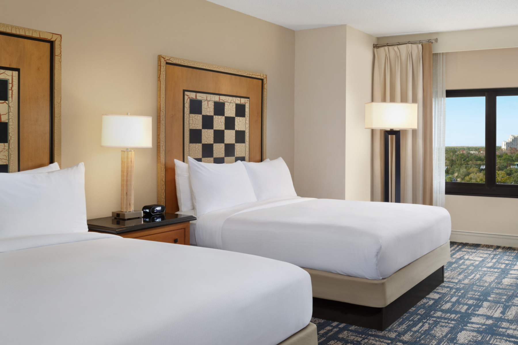 Hotel room with two double beds